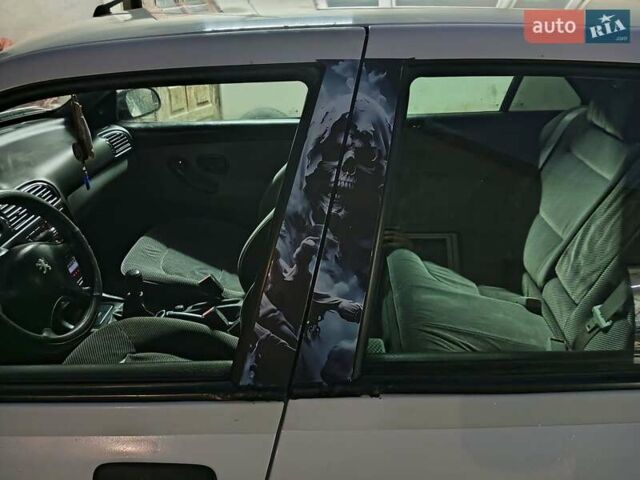 Белый Пежо 406, объемом двигателя 1.76 л и пробегом 200 тыс. км за 1850 $, фото 26 на Automoto.ua