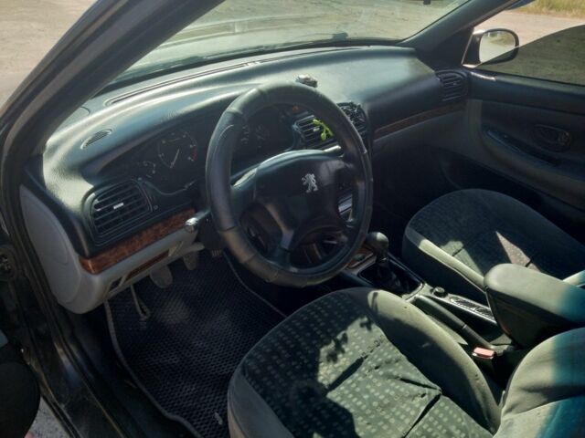 Черный Пежо 406, объемом двигателя 2 л и пробегом 340 тыс. км за 2500 $, фото 2 на Automoto.ua