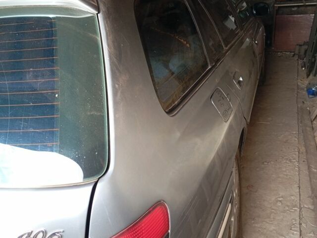 Серый Пежо 406, объемом двигателя 2.2 л и пробегом 360 тыс. км за 1432 $, фото 4 на Automoto.ua