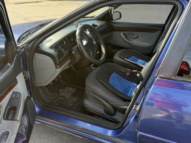 Синий Пежо 406, объемом двигателя 1.8 л и пробегом 5 тыс. км за 1800 $, фото 6 на Automoto.ua