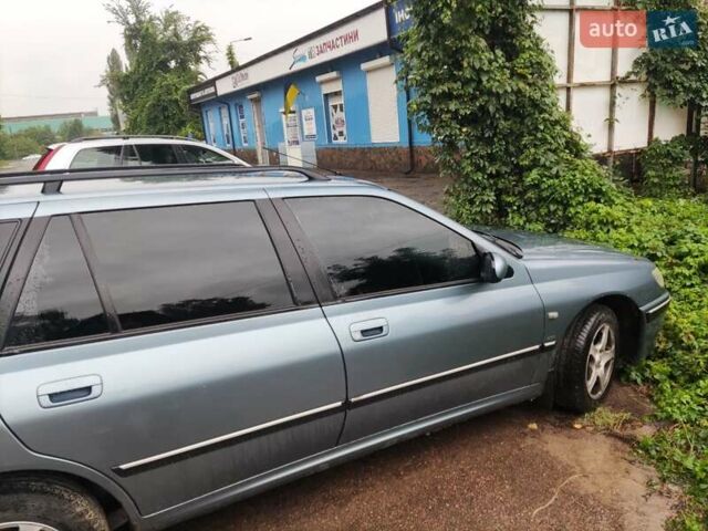 Синий Пежо 406, объемом двигателя 2 л и пробегом 540 тыс. км за 2400 $, фото 4 на Automoto.ua