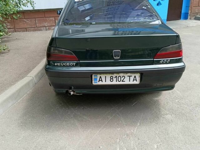 Зеленый Пежо 406, объемом двигателя 2 л и пробегом 250 тыс. км за 2750 $, фото 4 на Automoto.ua