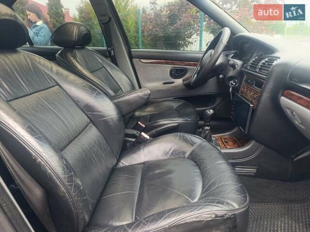 Зеленый Пежо 406, объемом двигателя 2.1 л и пробегом 220 тыс. км за 2600 $, фото 25 на Automoto.ua