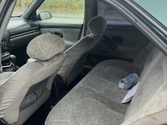 Зеленый Пежо 406, объемом двигателя 1.8 л и пробегом 270 тыс. км за 3000 $, фото 6 на Automoto.ua