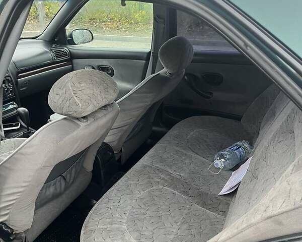 Зеленый Пежо 406, объемом двигателя 1.8 л и пробегом 270 тыс. км за 3000 $, фото 5 на Automoto.ua