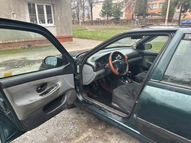 Зелений Пежо 406, об'ємом двигуна 2 л та пробігом 414 тис. км за 3000 $, фото 4 на Automoto.ua
