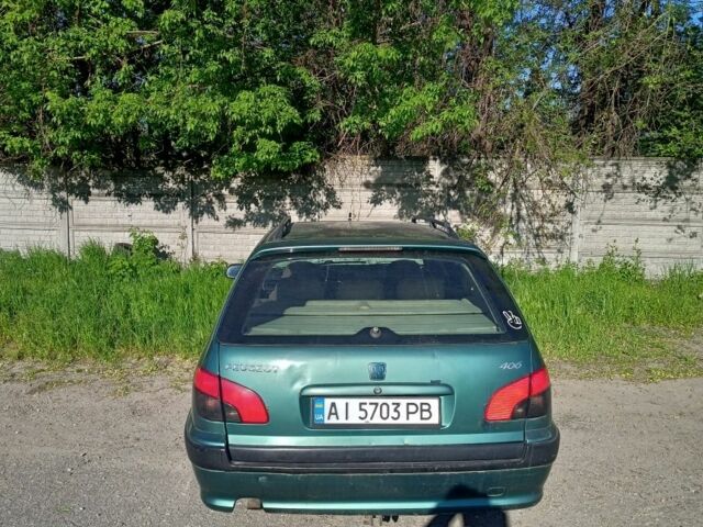 Зеленый Пежо 406, объемом двигателя 2 л и пробегом 364 тыс. км за 600 $, фото 5 на Automoto.ua