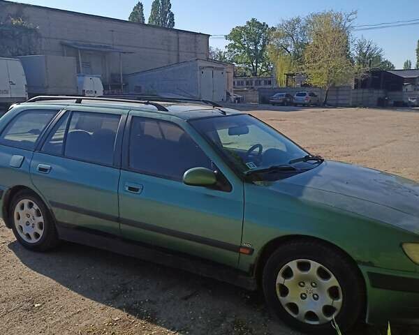 Зеленый Пежо 406, объемом двигателя 2 л и пробегом 484 тыс. км за 1000 $, фото 2 на Automoto.ua