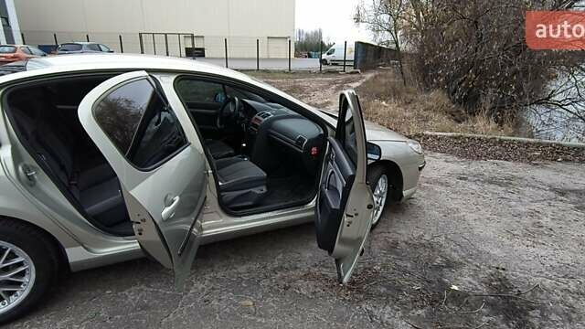 Бежевый Пежо 407, объемом двигателя 2 л и пробегом 237 тыс. км за 3800 $, фото 11 на Automoto.ua