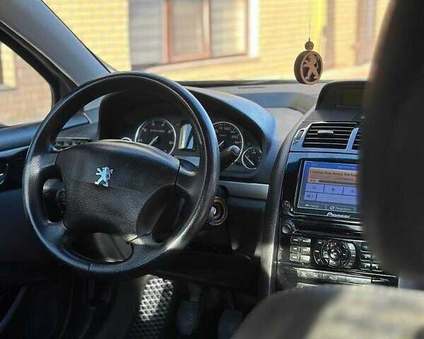 Бежевый Пежо 407, объемом двигателя 1.7 л и пробегом 295 тыс. км за 4100 $, фото 13 на Automoto.ua