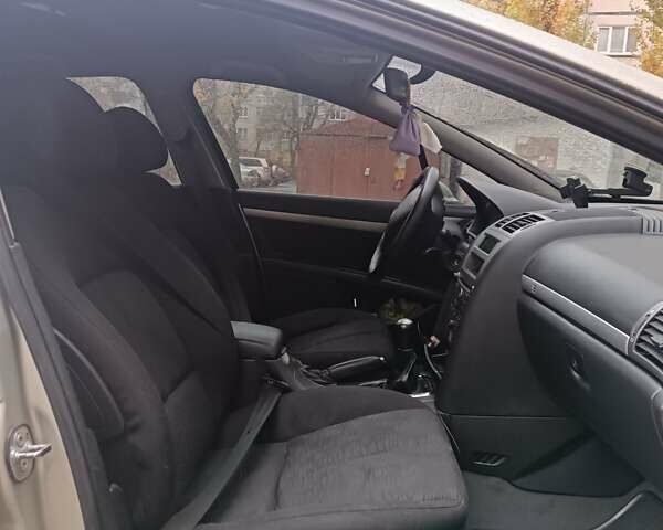 Бежевый Пежо 407, объемом двигателя 1.75 л и пробегом 318 тыс. км за 3700 $, фото 24 на Automoto.ua