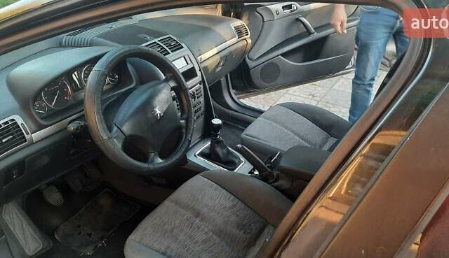 Чорний Пежо 407, об'ємом двигуна 2 л та пробігом 309 тис. км за 5000 $, фото 4 на Automoto.ua