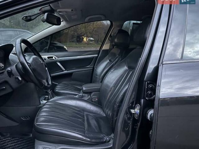 Пежо 407 2004 в Ровно на Automoto.ua Черный Пежо 407, объемом двигателя 2 л и пробегом 280 тыс. км за 3200 $, фото 38 на Automoto.ua