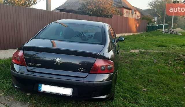 Чорний Пежо 407, об'ємом двигуна 2 л та пробігом 309 тис. км за 5000 $, фото 5 на Automoto.ua