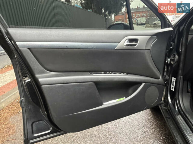 Черный Пежо 407, объемом двигателя 2.23 л и пробегом 257 тыс. км за 4299 $, фото 11 на Automoto.ua