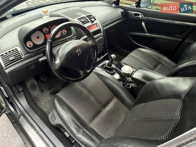 Черный Пежо 407, объемом двигателя 2.23 л и пробегом 257 тыс. км за 4299 $, фото 9 на Automoto.ua
