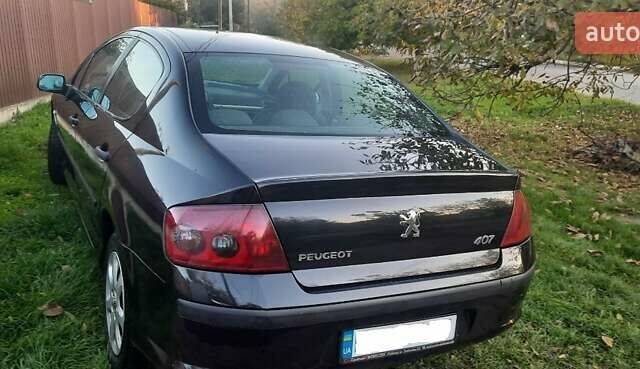 Чорний Пежо 407, об'ємом двигуна 2 л та пробігом 309 тис. км за 5000 $, фото 7 на Automoto.ua