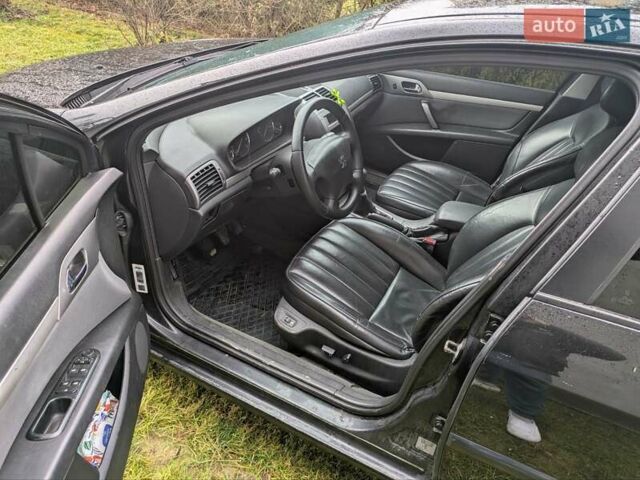 Черный Пежо 407, объемом двигателя 1.8 л и пробегом 245 тыс. км за 3333 $, фото 5 на Automoto.ua