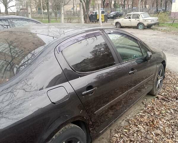 Черный Пежо 407, объемом двигателя 2 л и пробегом 200 тыс. км за 3700 $, фото 4 на Automoto.ua