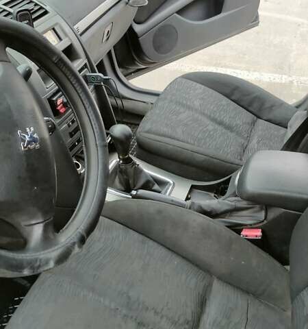 Черный Пежо 407, объемом двигателя 1.75 л и пробегом 363 тыс. км за 3300 $, фото 10 на Automoto.ua