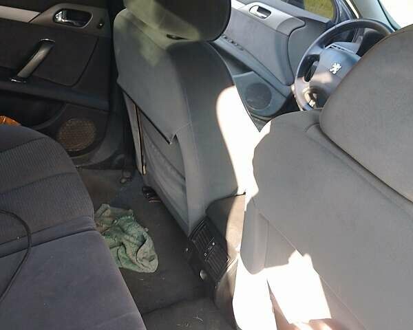 Черный Пежо 407, объемом двигателя 1.75 л и пробегом 229 тыс. км за 4300 $, фото 7 на Automoto.ua