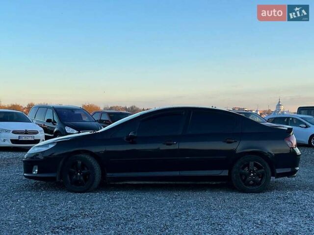 Чорний Пежо 407, об'ємом двигуна 1.8 л та пробігом 280 тис. км за 4290 $, фото 4 на Automoto.ua