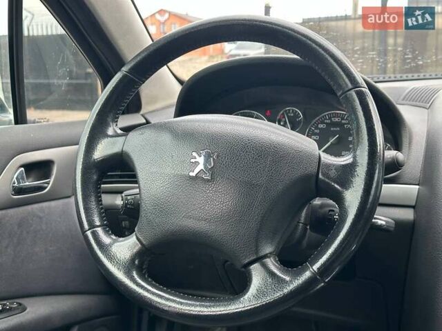 Черный Пежо 407, объемом двигателя 2 л и пробегом 225 тыс. км за 4190 $, фото 13 на Automoto.ua