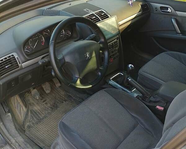 Черный Пежо 407, объемом двигателя 1.75 л и пробегом 229 тыс. км за 4300 $, фото 5 на Automoto.ua