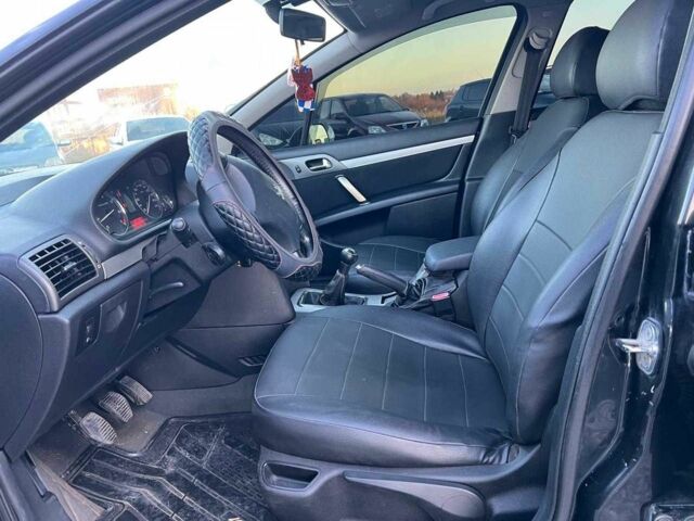 Чорний Пежо 407, об'ємом двигуна 1.8 л та пробігом 280 тис. км за 4290 $, фото 19 на Automoto.ua