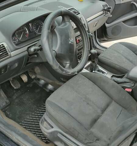 Черный Пежо 407, объемом двигателя 1.75 л и пробегом 363 тыс. км за 3300 $, фото 9 на Automoto.ua