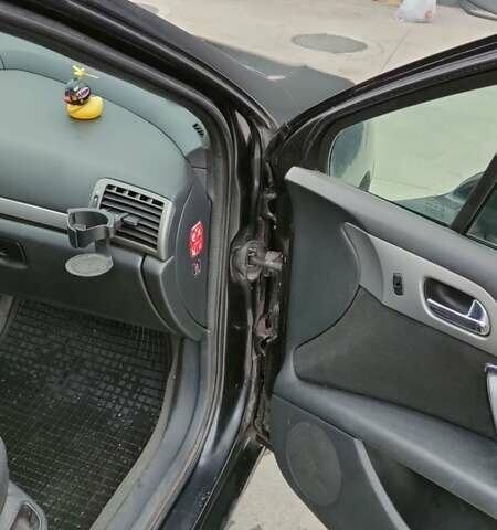 Черный Пежо 407, объемом двигателя 1.75 л и пробегом 363 тыс. км за 3300 $, фото 20 на Automoto.ua