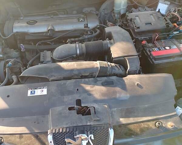 Черный Пежо 407, объемом двигателя 1.75 л и пробегом 229 тыс. км за 4300 $, фото 11 на Automoto.ua