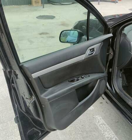 Черный Пежо 407, объемом двигателя 1.75 л и пробегом 363 тыс. км за 3300 $, фото 7 на Automoto.ua