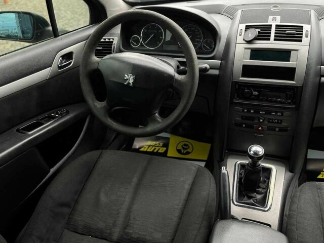 Черный Пежо 407, объемом двигателя 1.7 л и пробегом 238 тыс. км за 3700 $, фото 14 на Automoto.ua