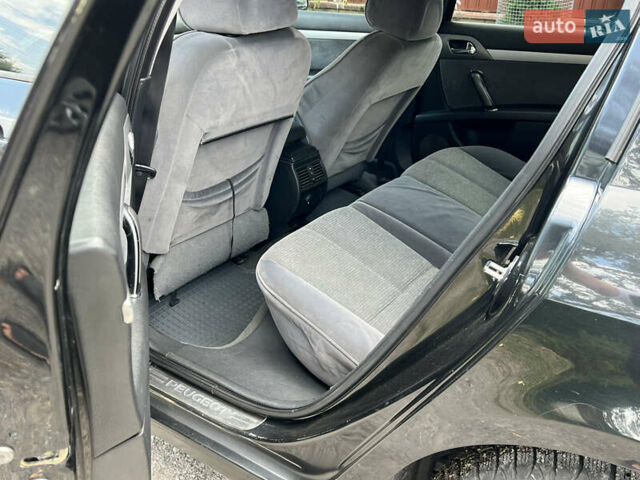 Черный Пежо 407, объемом двигателя 2 л и пробегом 390 тыс. км за 2650 $, фото 6 на Automoto.ua