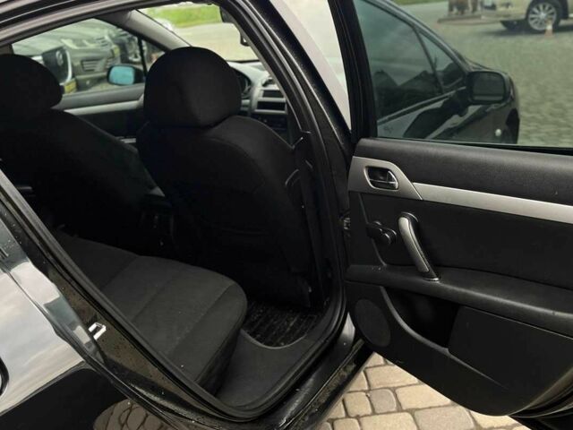 Черный Пежо 407, объемом двигателя 1.7 л и пробегом 238 тыс. км за 3700 $, фото 22 на Automoto.ua