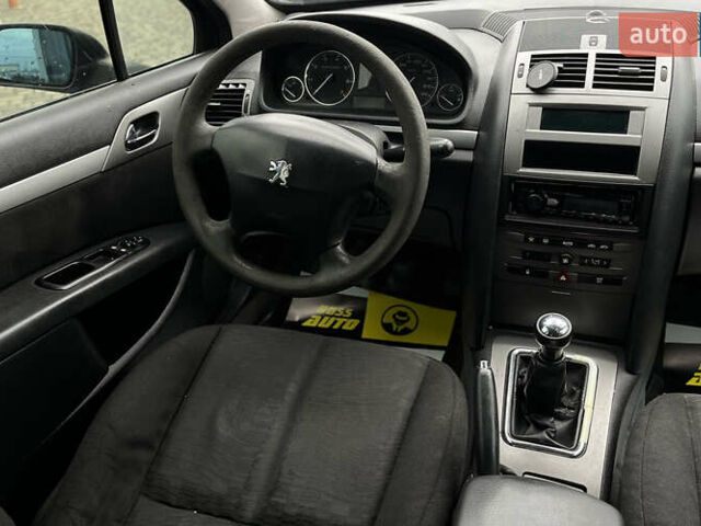 Черный Пежо 407, объемом двигателя 1.75 л и пробегом 238 тыс. км за 3700 $, фото 9 на Automoto.ua