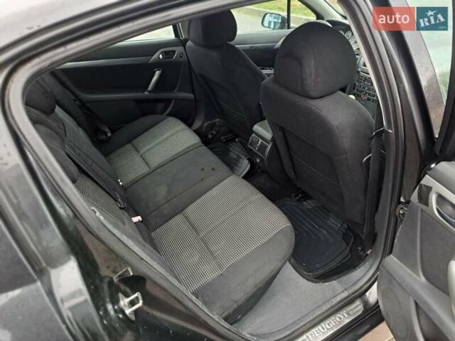Черный Пежо 407, объемом двигателя 2 л и пробегом 350 тыс. км за 1550 $, фото 7 на Automoto.ua