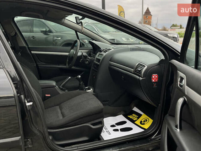 Черный Пежо 407, объемом двигателя 1.75 л и пробегом 238 тыс. км за 3700 $, фото 22 на Automoto.ua