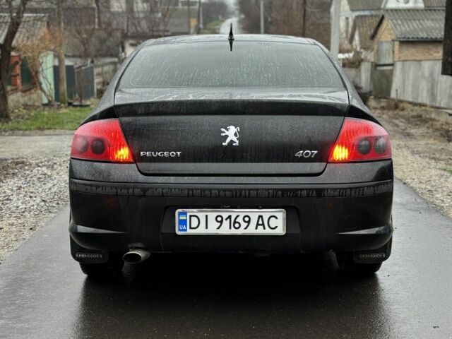 Черный Пежо 407, объемом двигателя 1.8 л и пробегом 220 тыс. км за 3999 $, фото 5 на Automoto.ua