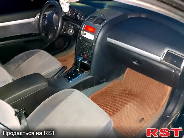 Черный Пежо 407, объемом двигателя 2 л и пробегом 301 тыс. км за 3800 $, фото 12 на Automoto.ua