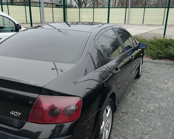 Черный Пежо 407, объемом двигателя 1.75 л и пробегом 112 тыс. км за 4199 $, фото 13 на Automoto.ua