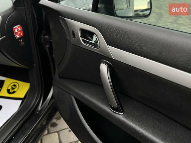 Черный Пежо 407, объемом двигателя 1.75 л и пробегом 238 тыс. км за 3700 $, фото 21 на Automoto.ua