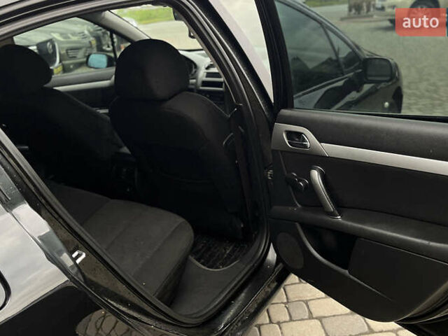 Черный Пежо 407, объемом двигателя 1.75 л и пробегом 238 тыс. км за 3700 $, фото 20 на Automoto.ua