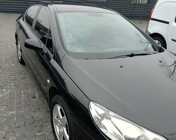 Черный Пежо 407, объемом двигателя 1.75 л и пробегом 112 тыс. км за 4199 $, фото 9 на Automoto.ua