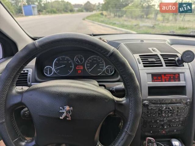 Черный Пежо 407, объемом двигателя 2 л и пробегом 327 тыс. км за 4500 $, фото 5 на Automoto.ua