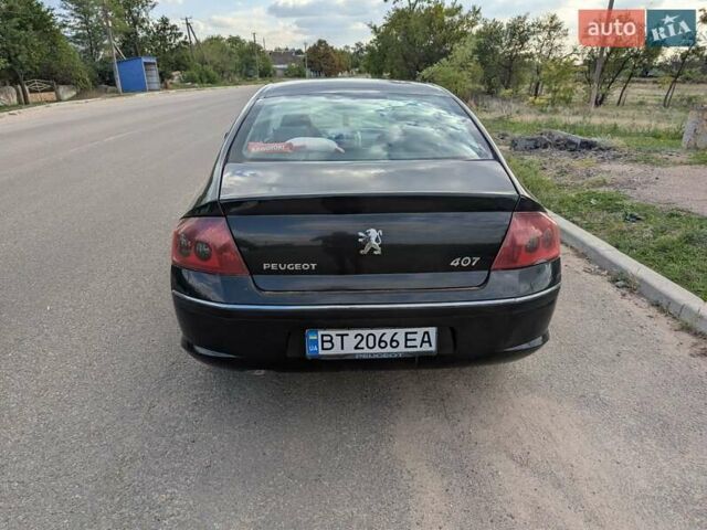 Черный Пежо 407, объемом двигателя 2 л и пробегом 327 тыс. км за 4500 $, фото 7 на Automoto.ua