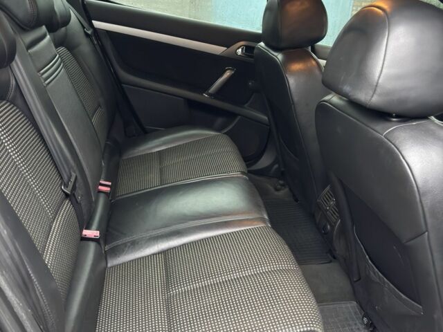 Черный Пежо 407, объемом двигателя 1.8 л и пробегом 220 тыс. км за 3999 $, фото 8 на Automoto.ua