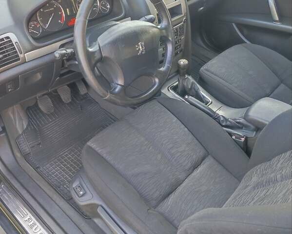 Черный Пежо 407, объемом двигателя 1.6 л и пробегом 242 тыс. км за 4500 $, фото 11 на Automoto.ua