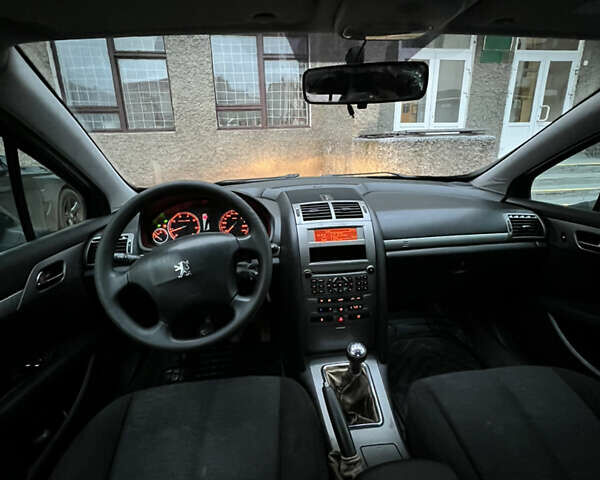 Черный Пежо 407, объемом двигателя 1.8 л и пробегом 297 тыс. км за 2899 $, фото 10 на Automoto.ua